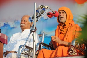 FILE PHOTO: Pejawar Seer with RSS Chief Mohan Bhagwat at Hindu Shakti Sangam of Hubli-2012