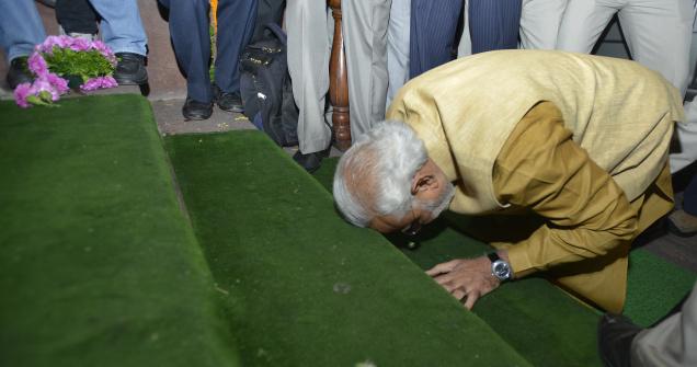 BJP's Prime Minister designate, Narendra Modi, bows down while entering the Parliament House in New Delhi on Tuesday. Photo Courtesy: Rajeev Bhatt, The Hindu 