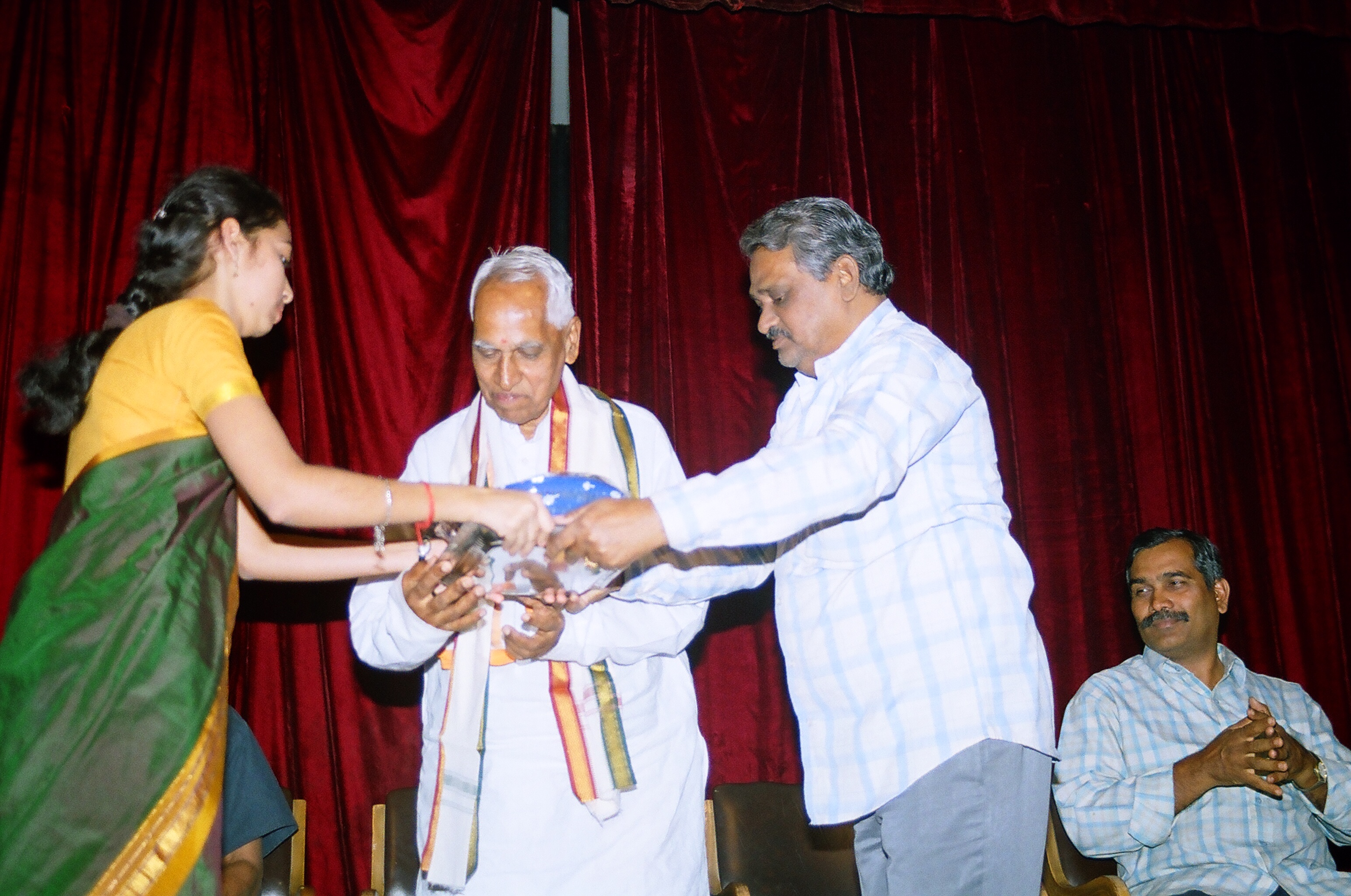 Receiving an honour from Samskar Bharati 